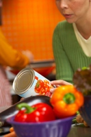 Woman planning/preparing a meal